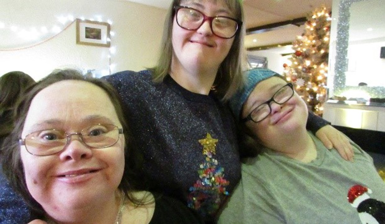 three women at a Christmas event