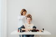 Pauline doing a young girls hair